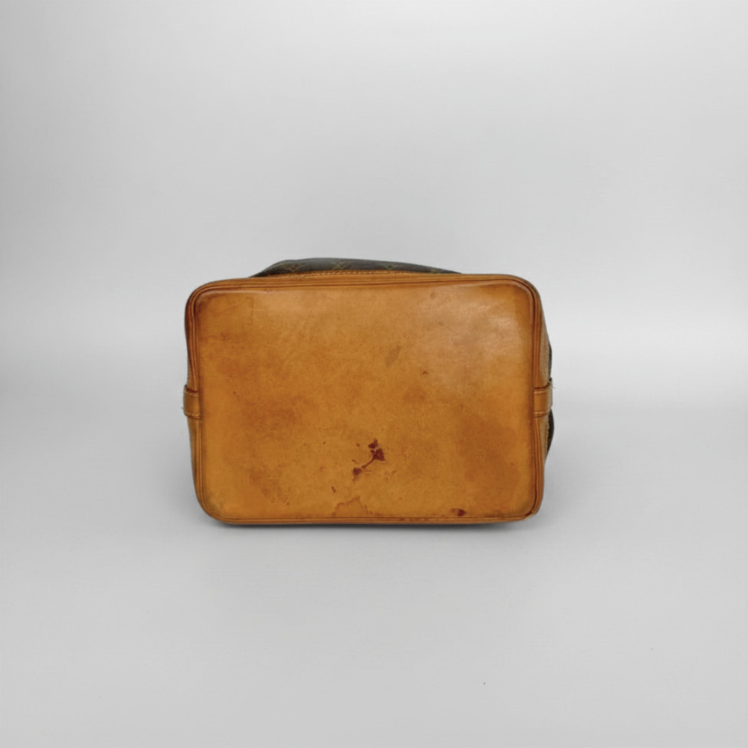 Louis Vuitton Petit Noe Monogram Canvas on a white background