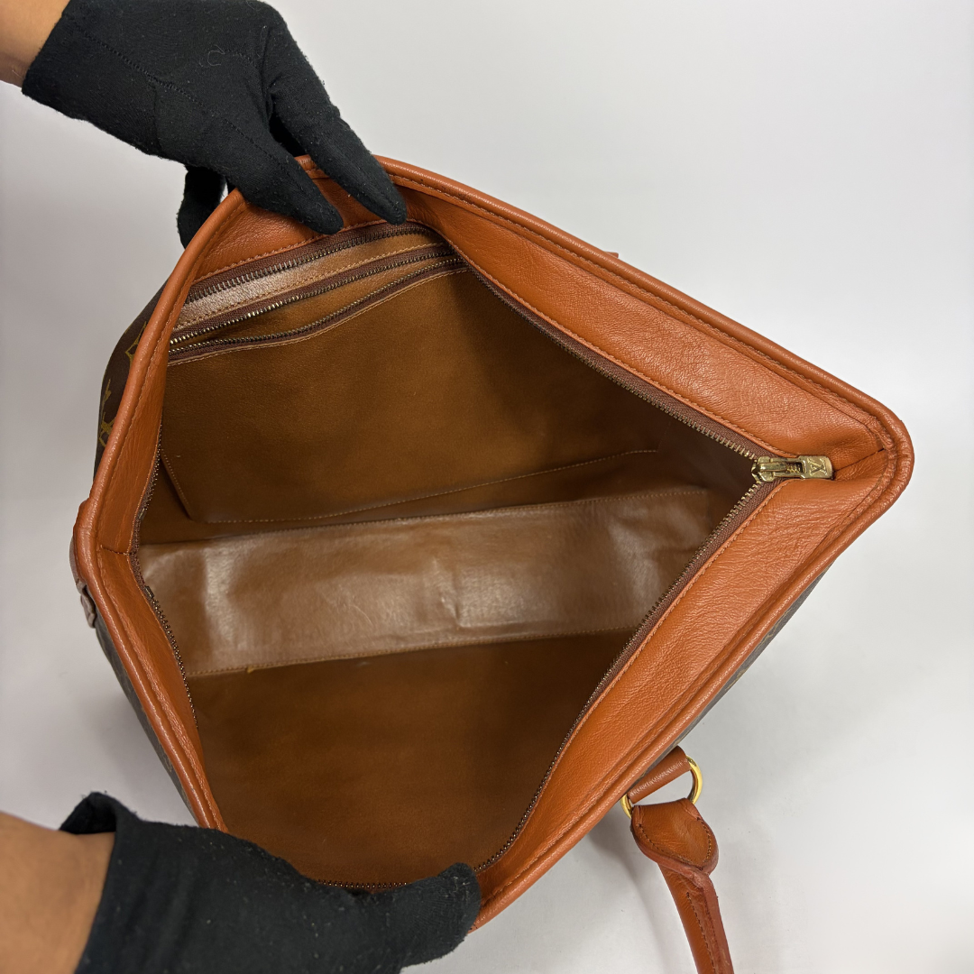Louis Vuitton Sac Weekend PM Monogram Canvas on a white background