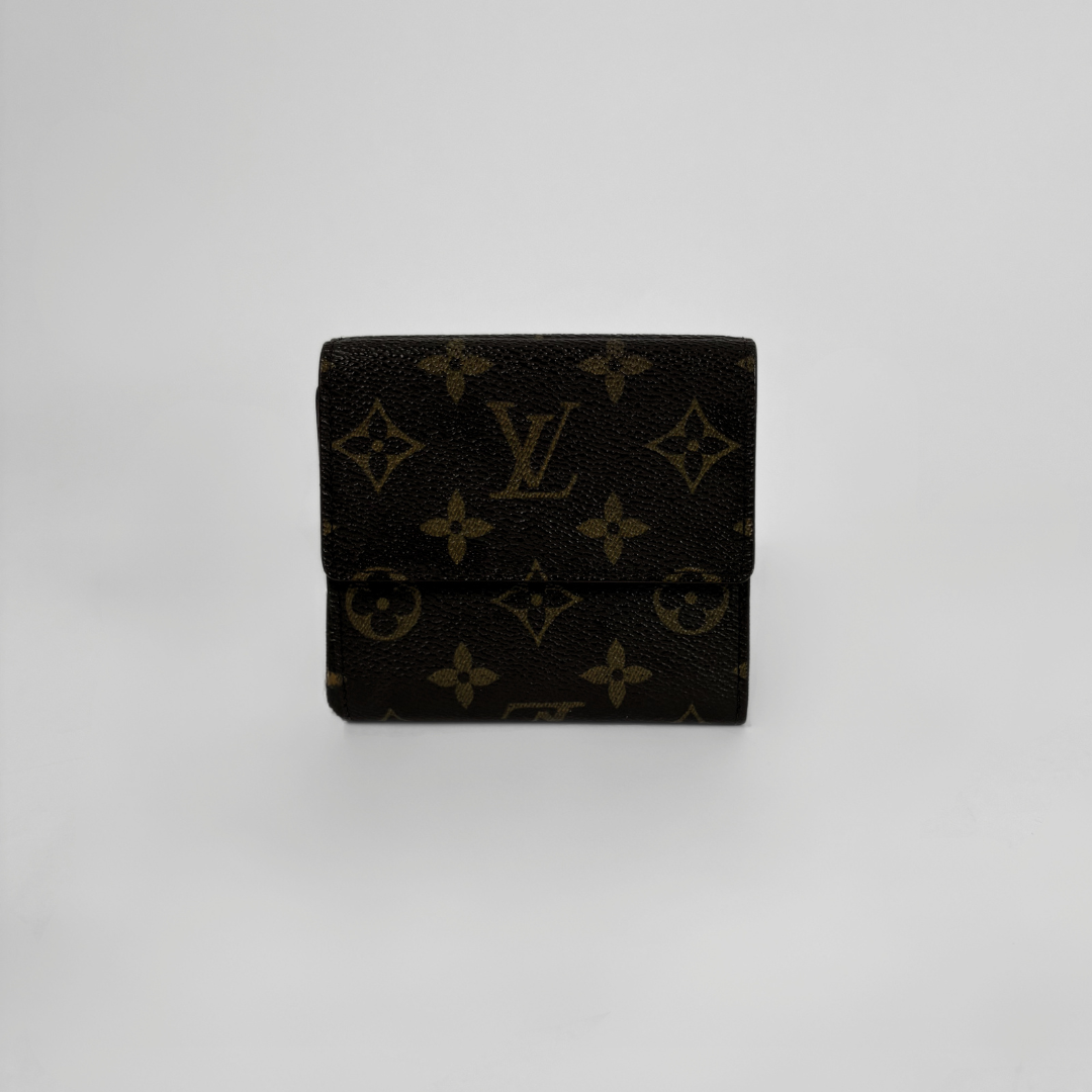 Louis Vuitton Druk Wallet on a white background