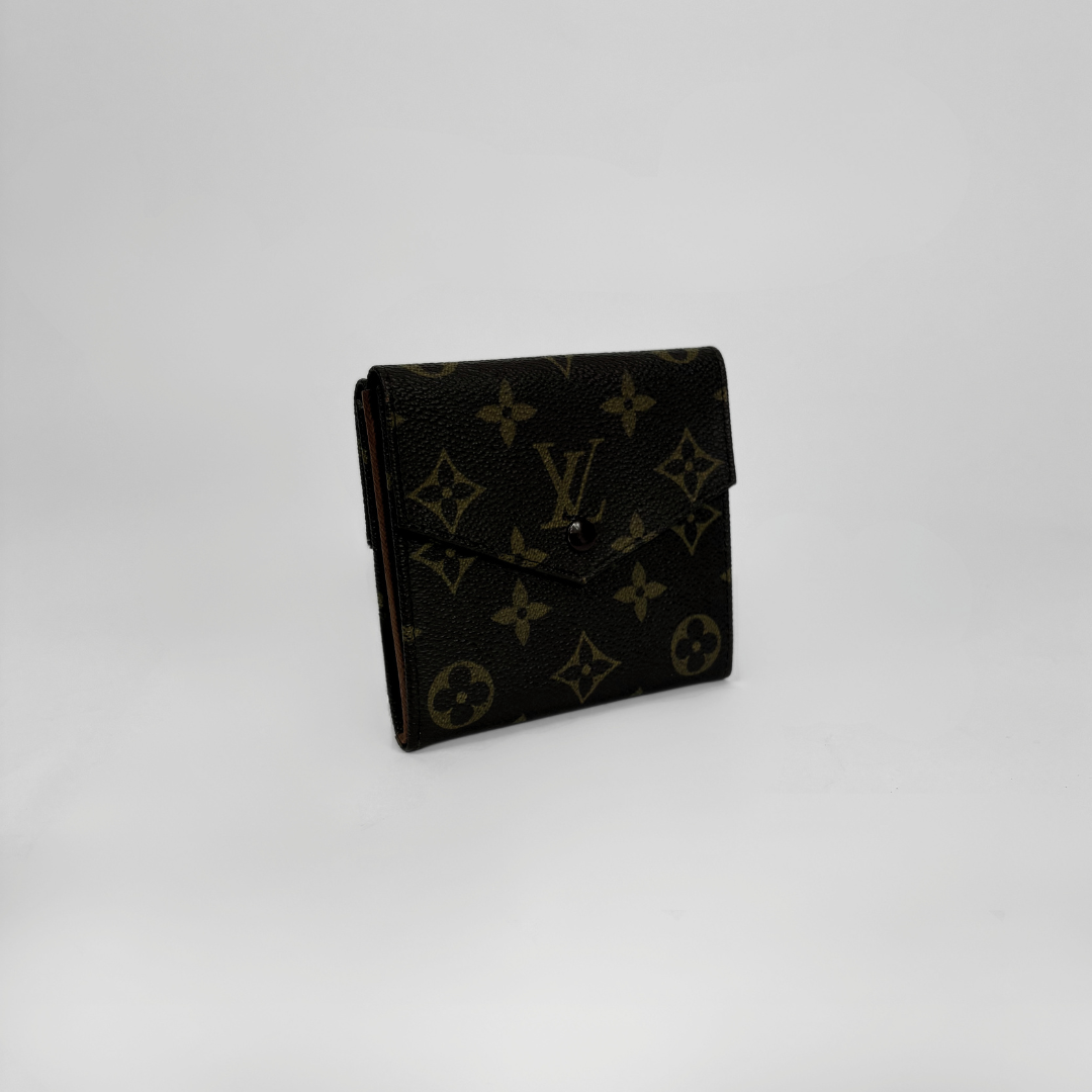 Louis Vuitton Druk Wallet on a white background
