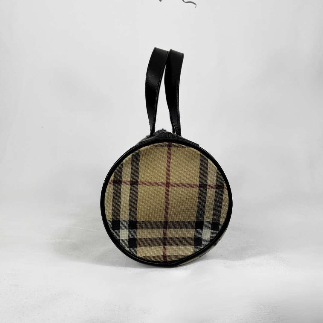 Burberry Mini Barrel handbag in the iconic beige House Check canvas with brown leather trims and details, displayed on a light grey background.