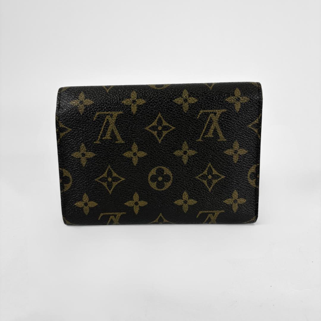Louis Vuitton International Wallet Medium on a white background