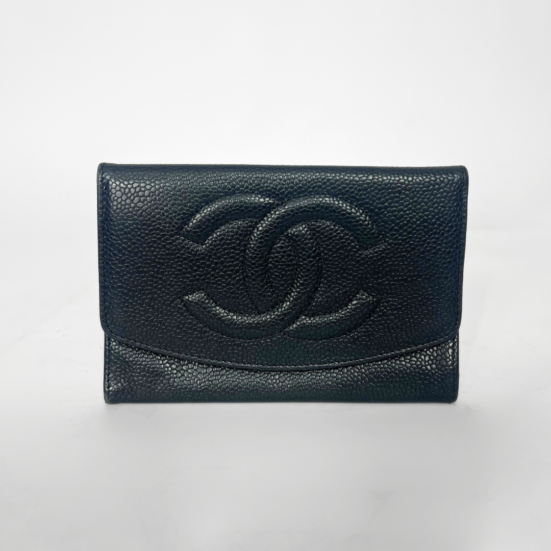 Black leather wallet with Chanel logo on a white background