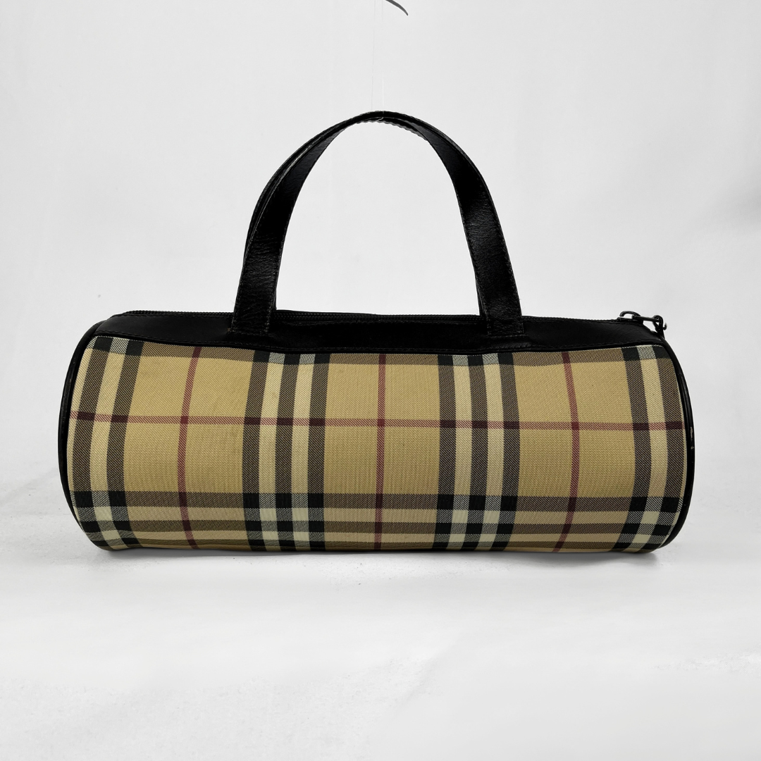 Burberry Mini Barrel handbag in the iconic beige House Check canvas with brown leather trims and details, displayed on a light grey background.