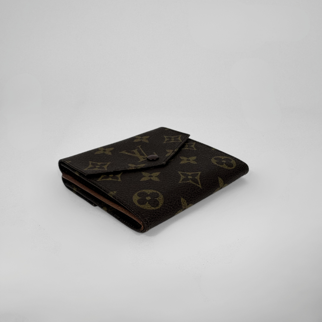 Louis Vuitton Druk Wallet on a white background