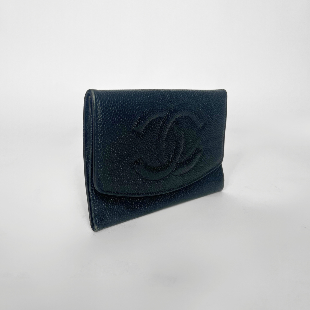 Black leather wallet with Chanel logo on a white background