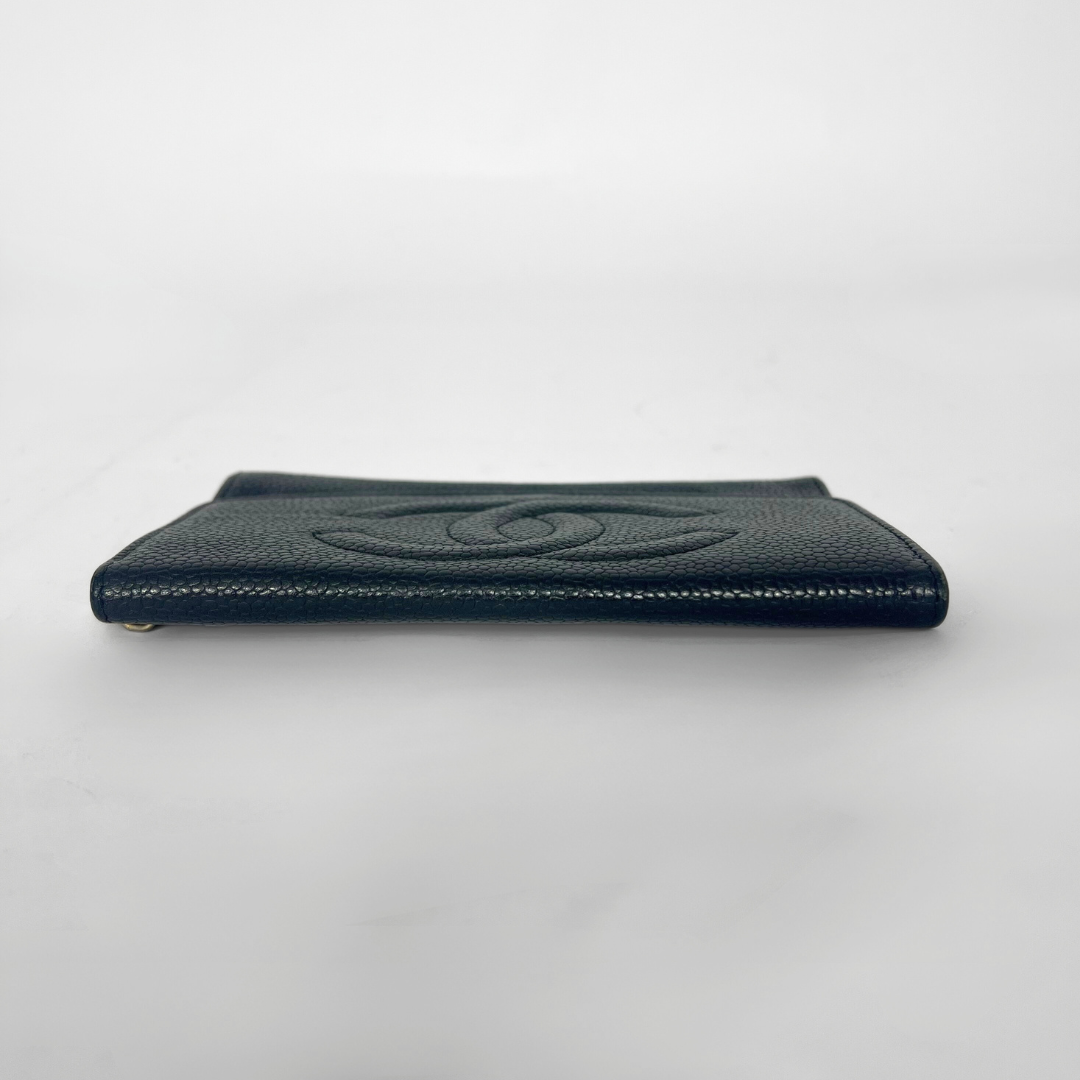 Dark green leather wallet with brand logo on a light gray background