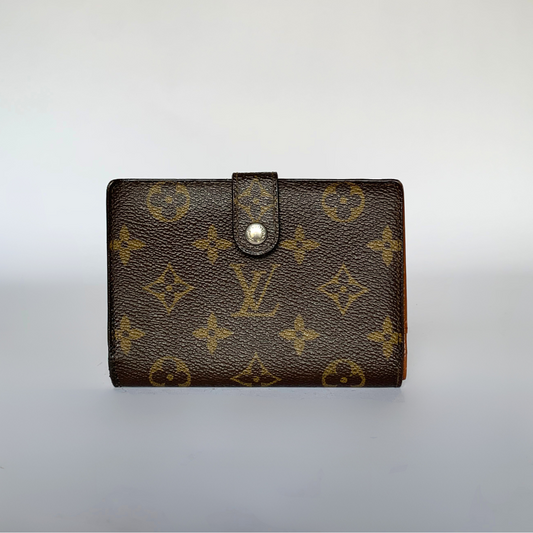 A Louis Vuitton monogram canvas bifold wallet with a snap button closure, photographed against a neutral light gray background.