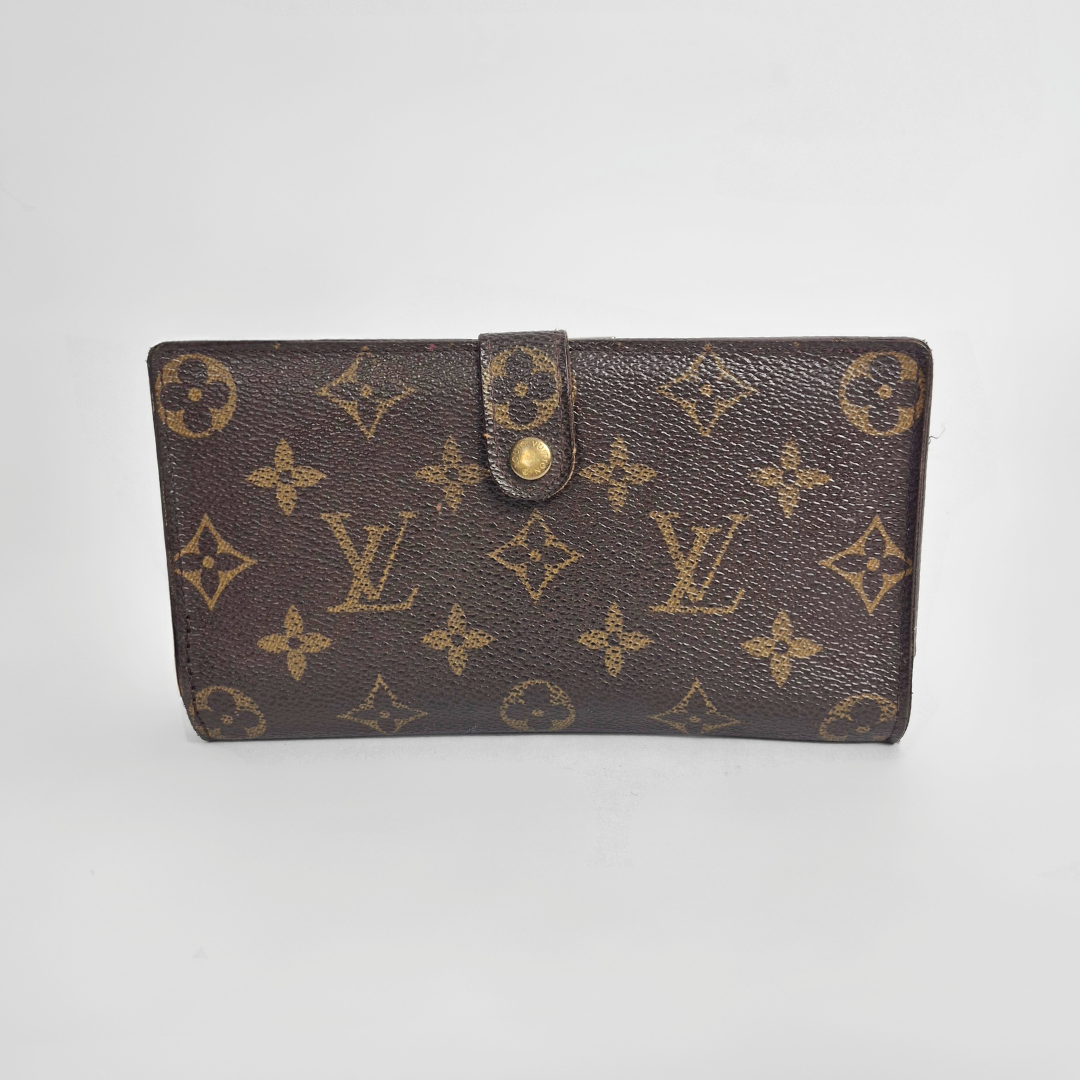 Louis Vuitton Cartera con estampado de monogramas sobre fondo blanco