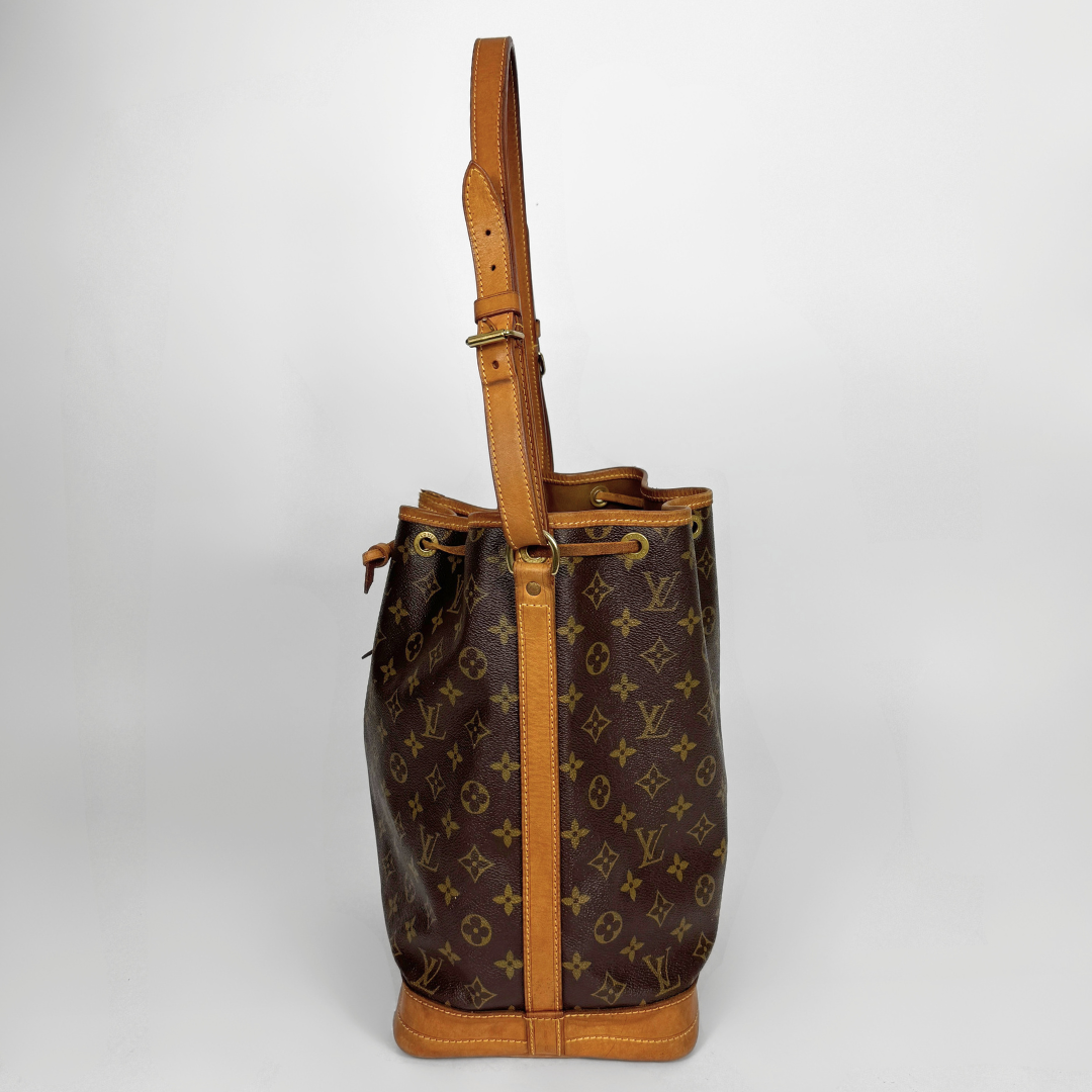 Louis Vuitton Petit Noe Monogram Canvas on a white background