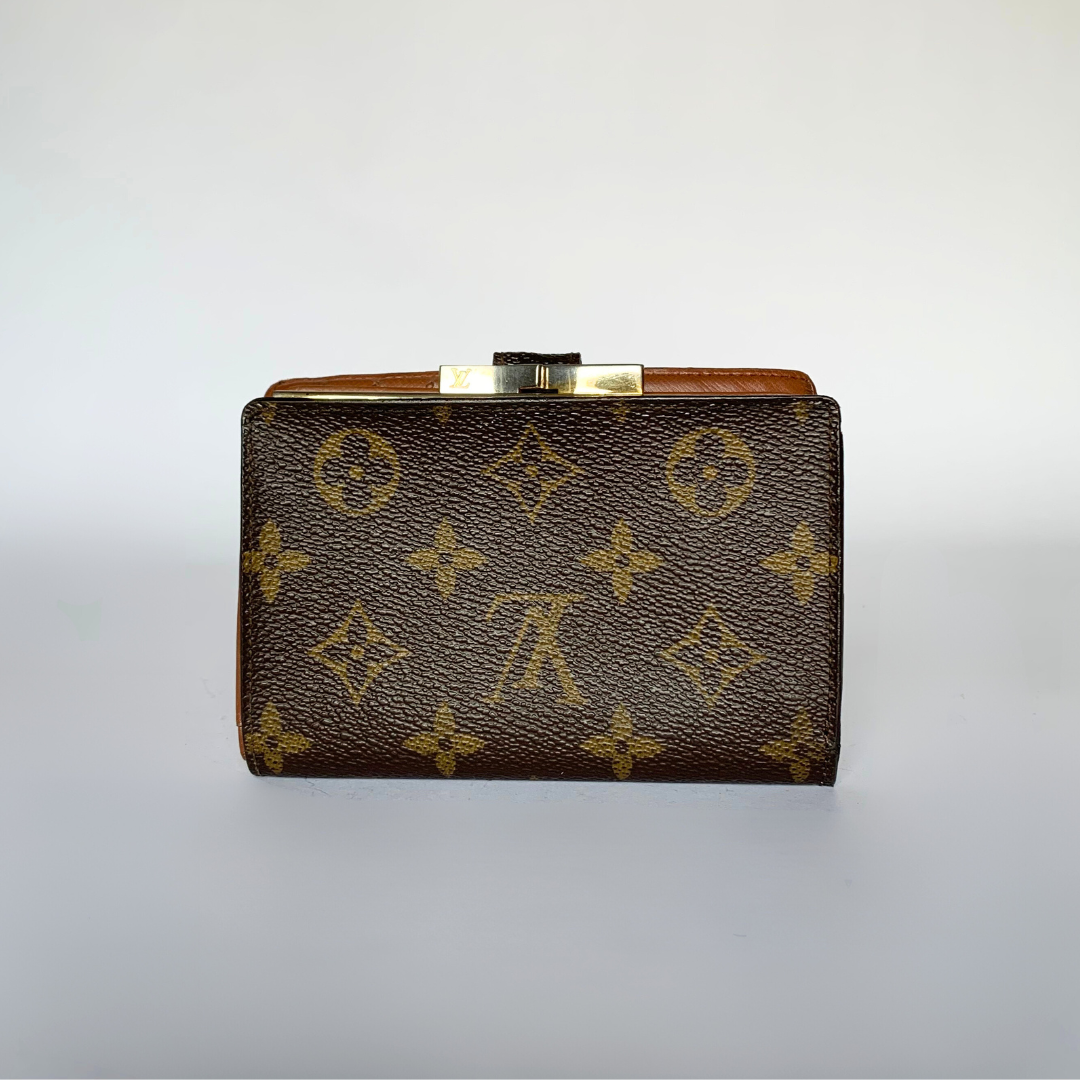 A Louis Vuitton monogram canvas clutch or coin purse with a brown leather frame and a gold-tone metal clasp, shown against a plain light gray background.
