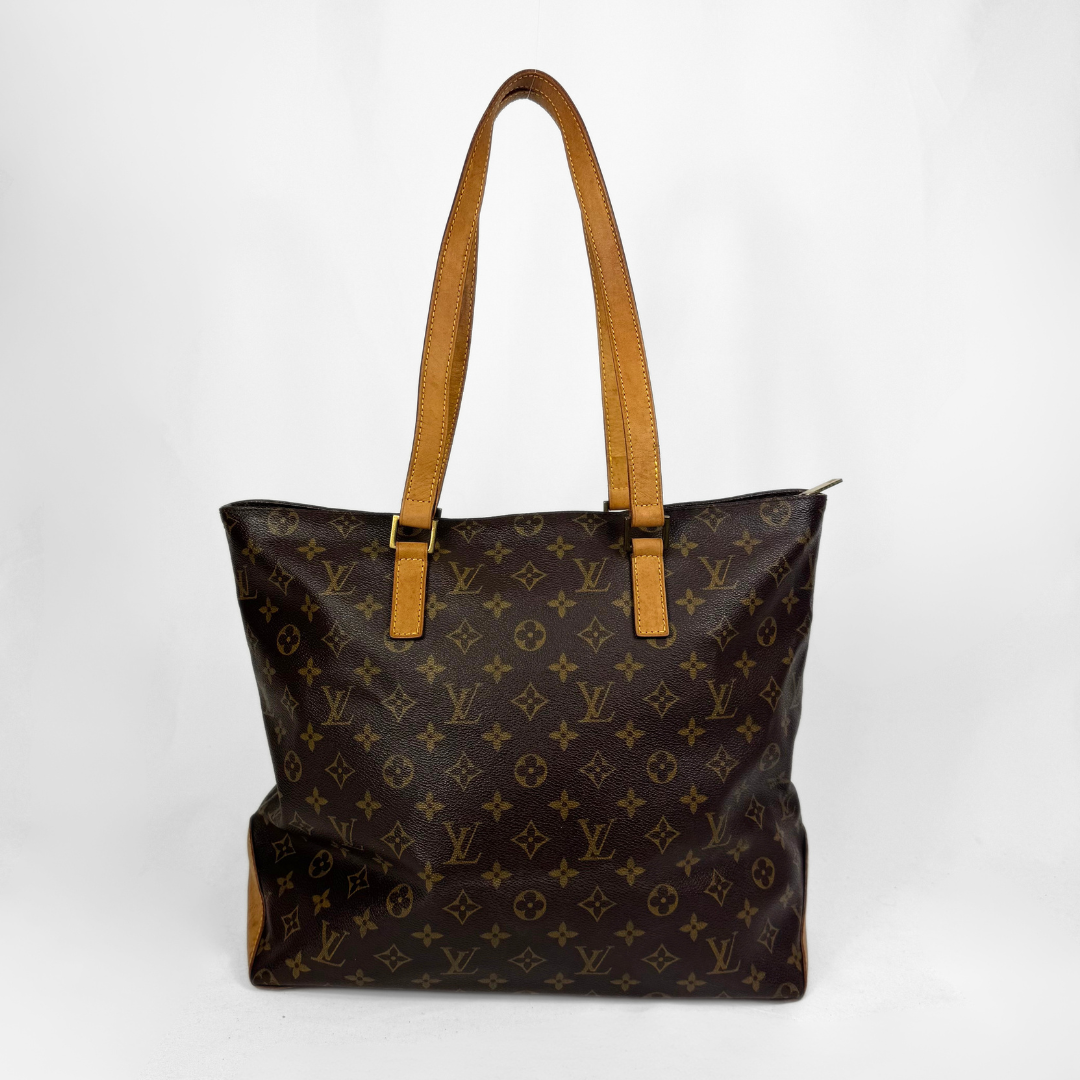 A Louis Vuitton monogram canvas tote bag with tan leather shoulder straps and trim, shown against a plain white background.