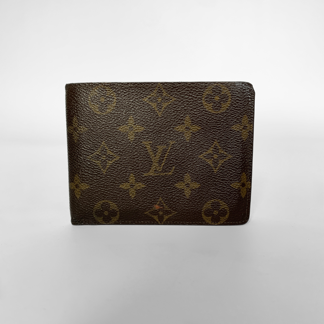 A Louis Vuitton monogram bifold wallet in brown coated canvas with tan monogram motifs, shown against a light gray gradient background.