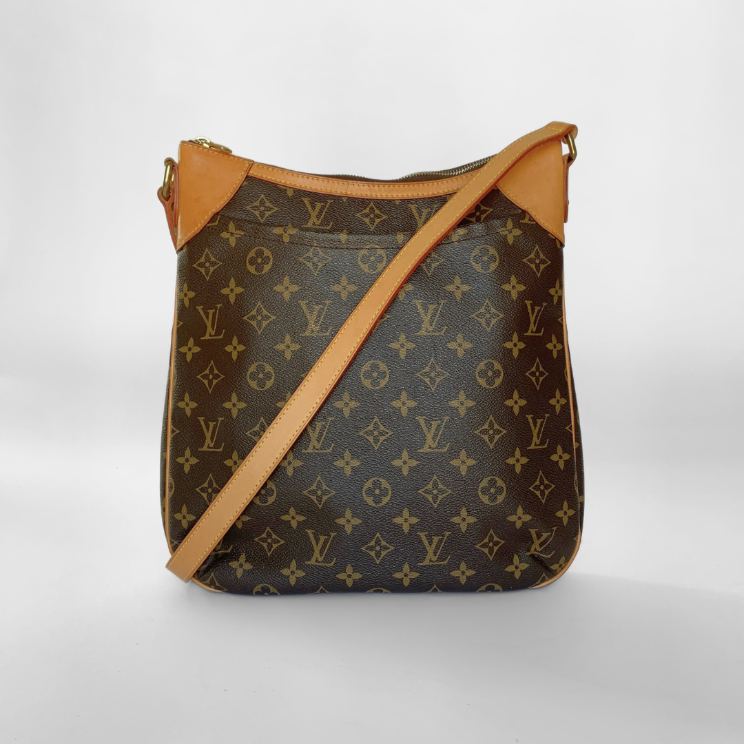 Designer handbag with monogram pattern on a white background