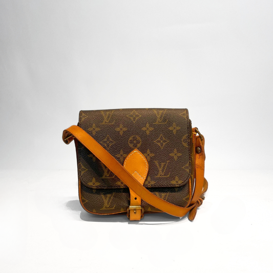 Louis Vuitton Cartouchière PM Monogram Canvas on a white background