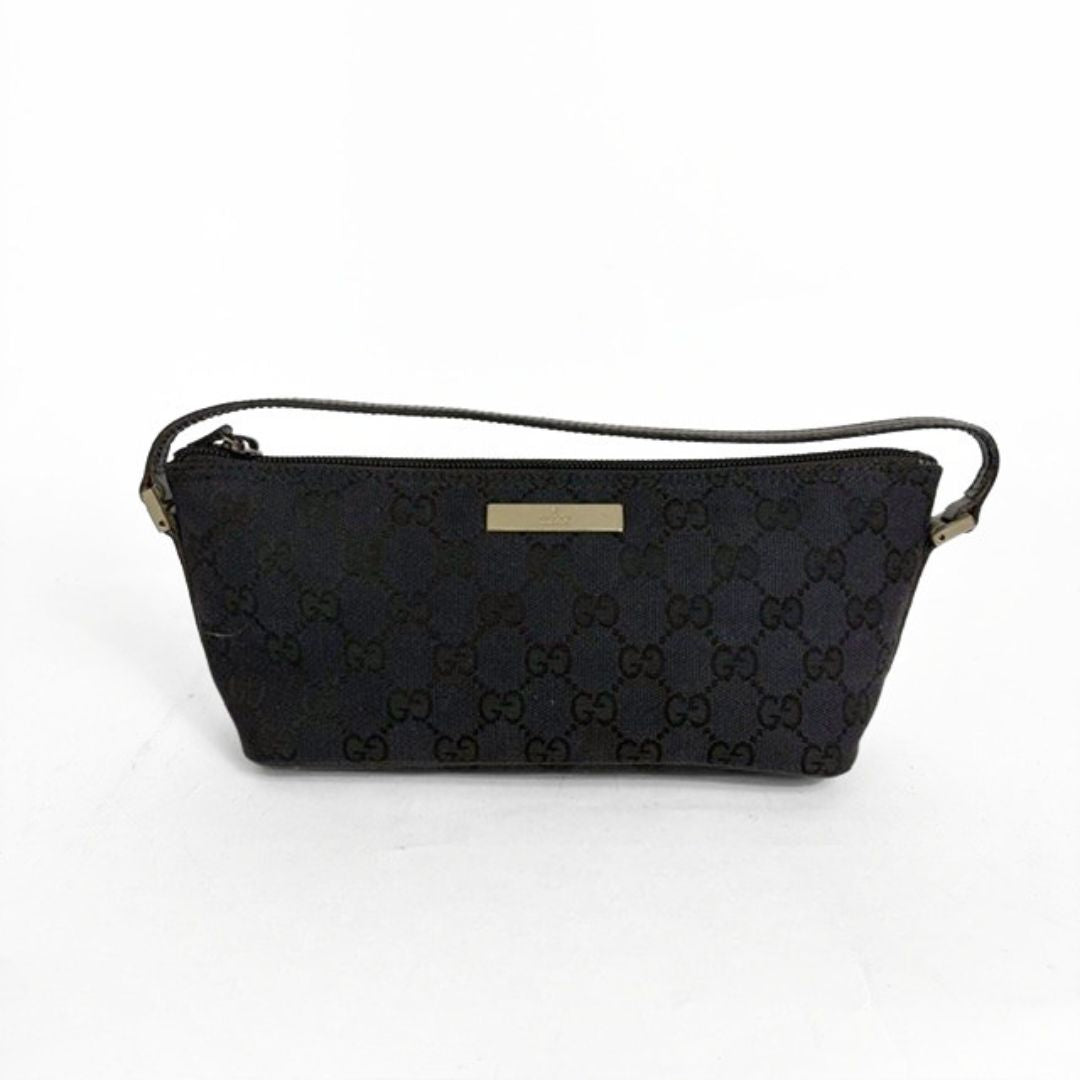Black quilted handbag with brand logo on a white background