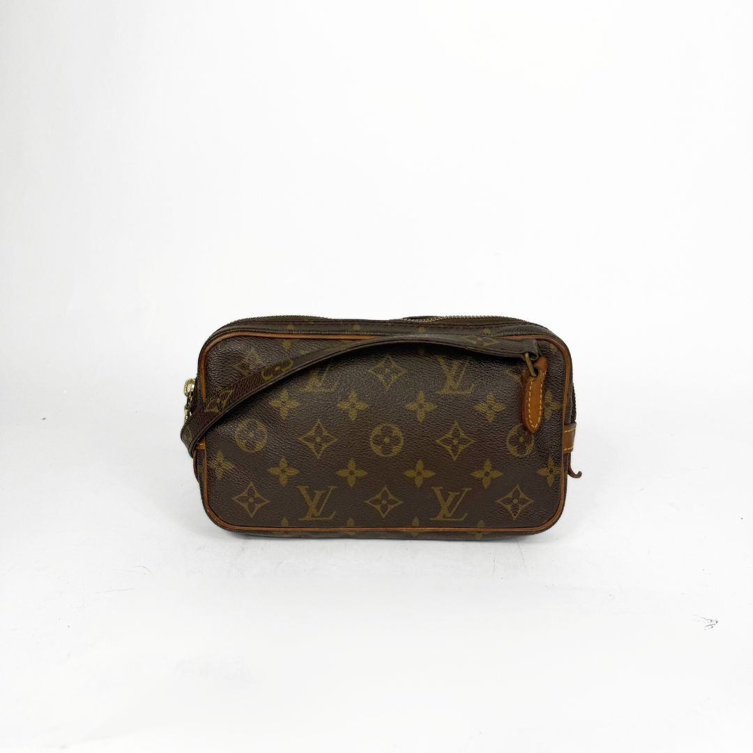 Brown monogram handbag on a white background