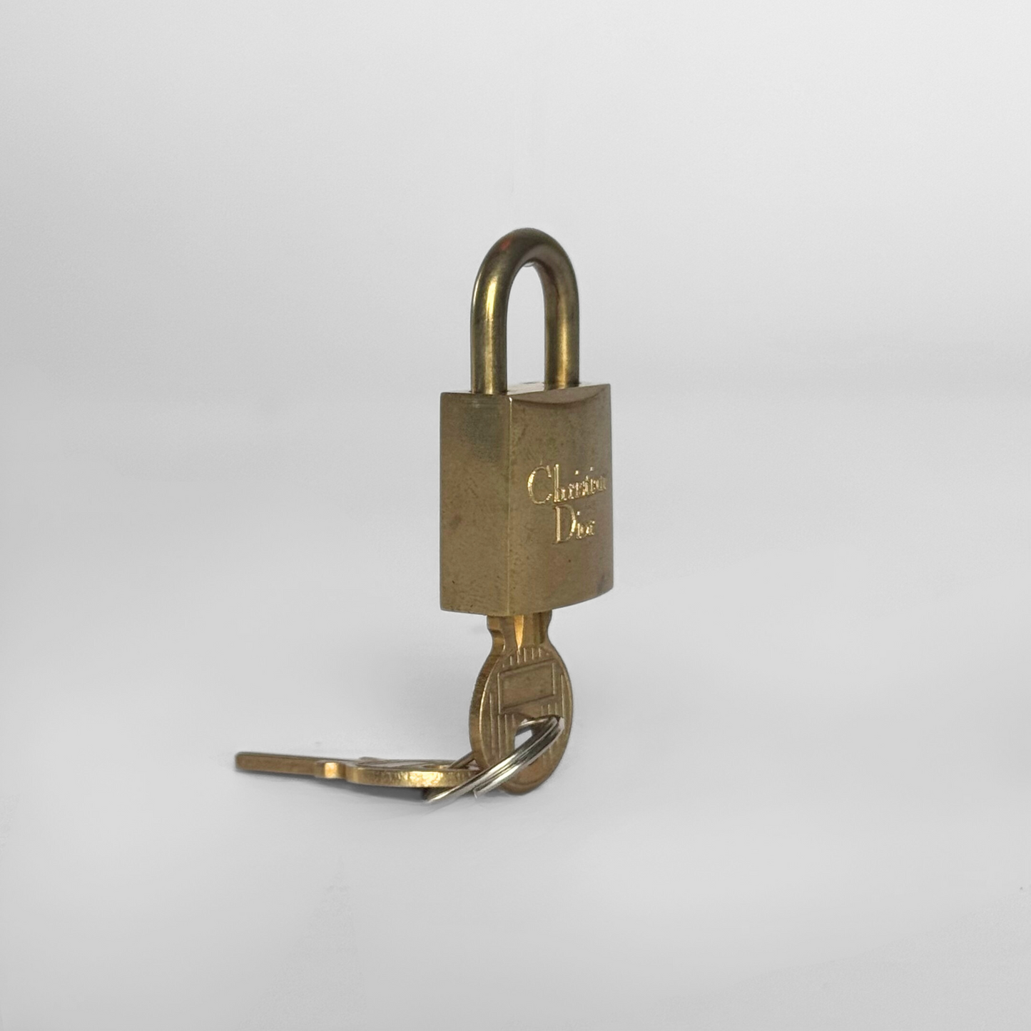 Dior Lock With Key Gold Metal