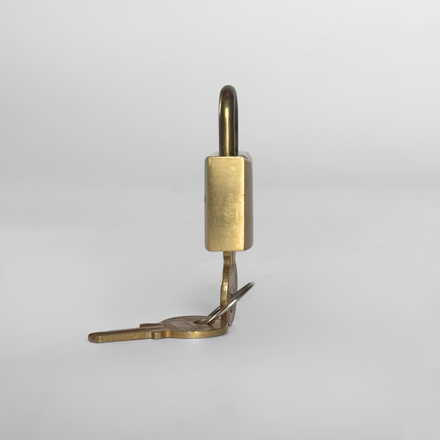 Dior Lock With Key Gold Metal