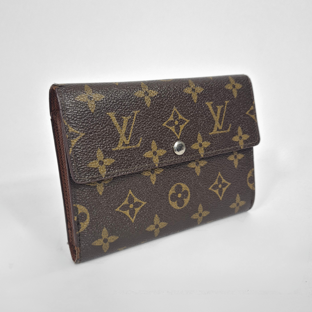 Louis Vuitton wallet with monogram pattern