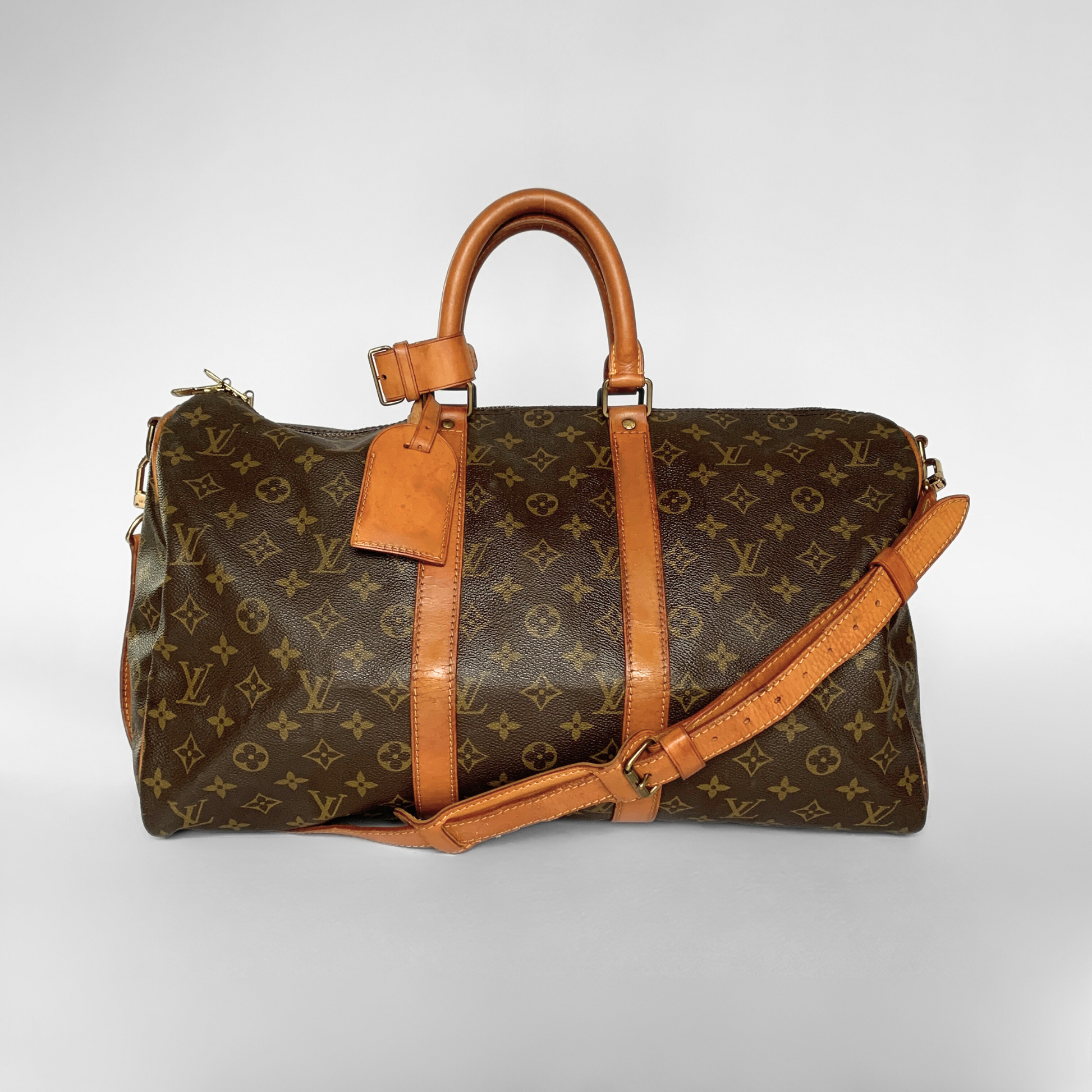 Louis Vuitton Louis Vuitton Keepall 45 Bandouli&egrave;re Monogram Canvas - Handbags - Etoile Luxury Vintage