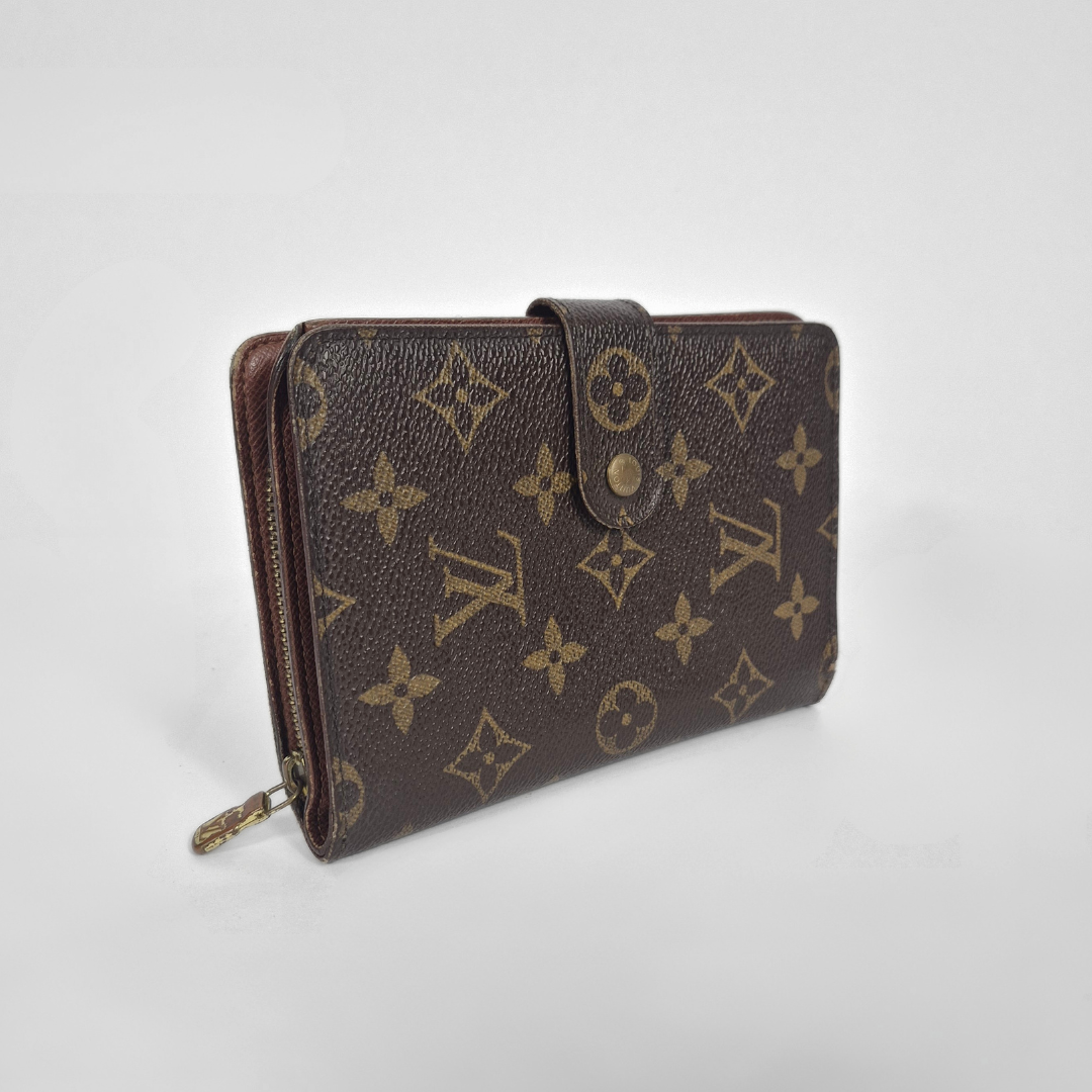 Brown wallet with monogram pattern on a white background