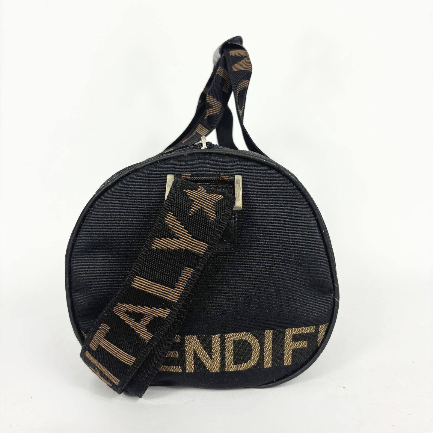 Black duffel bag with 'FENDI' logo on a white background