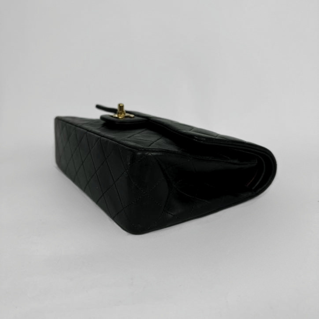 Chanel Medium Double Classic Flapbag on a light background