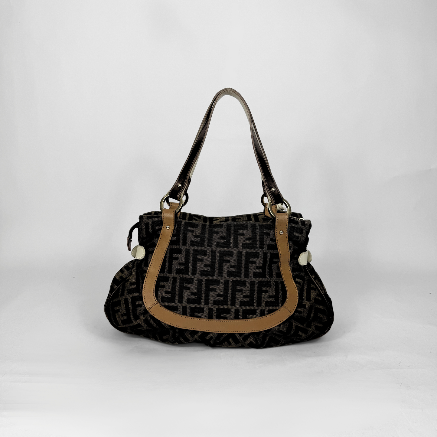 Fendi Zucca monogram canvas shoulder bag with letaher trim and a large white cicular FENDI charm.