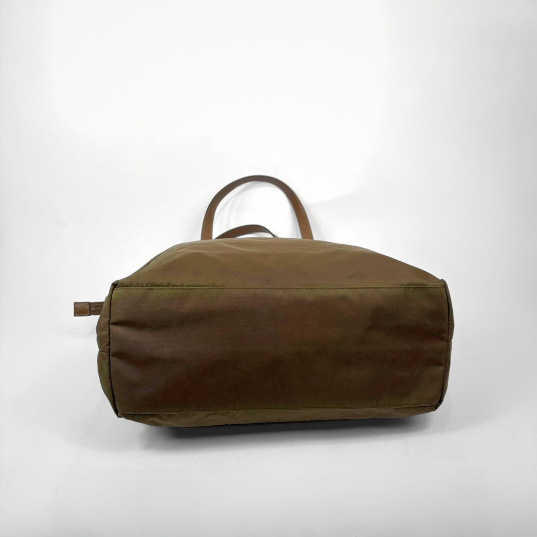 Brown duffel bag on a white background