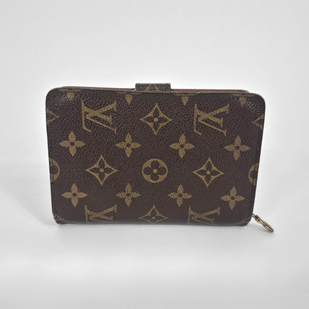 Brown wallet with gold monogram pattern on a white background