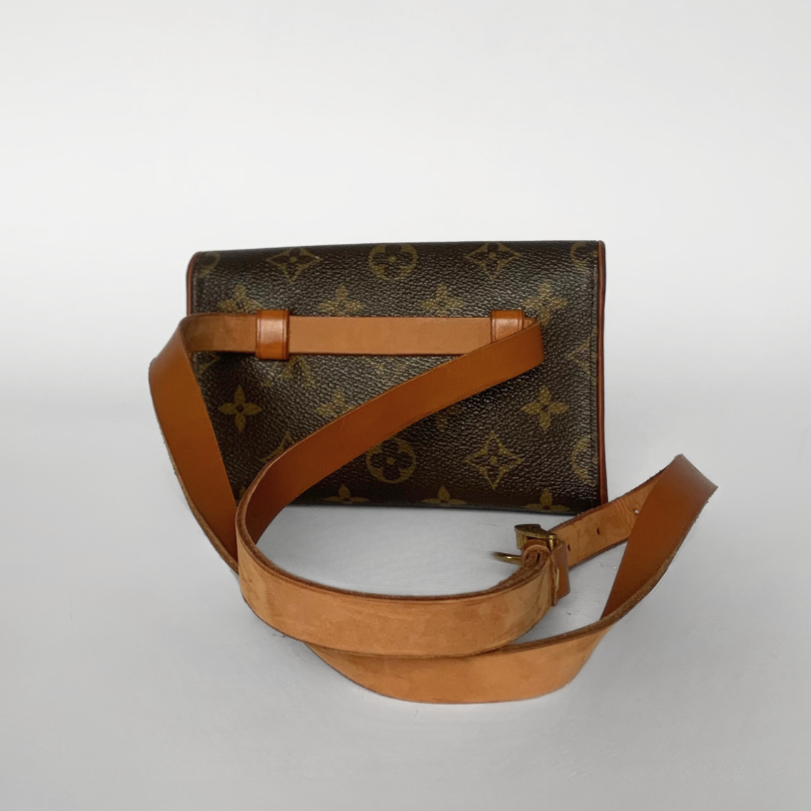 Louis Vuitton Pochette Florentine Monogram Canvas l Etoile de Saint Honore