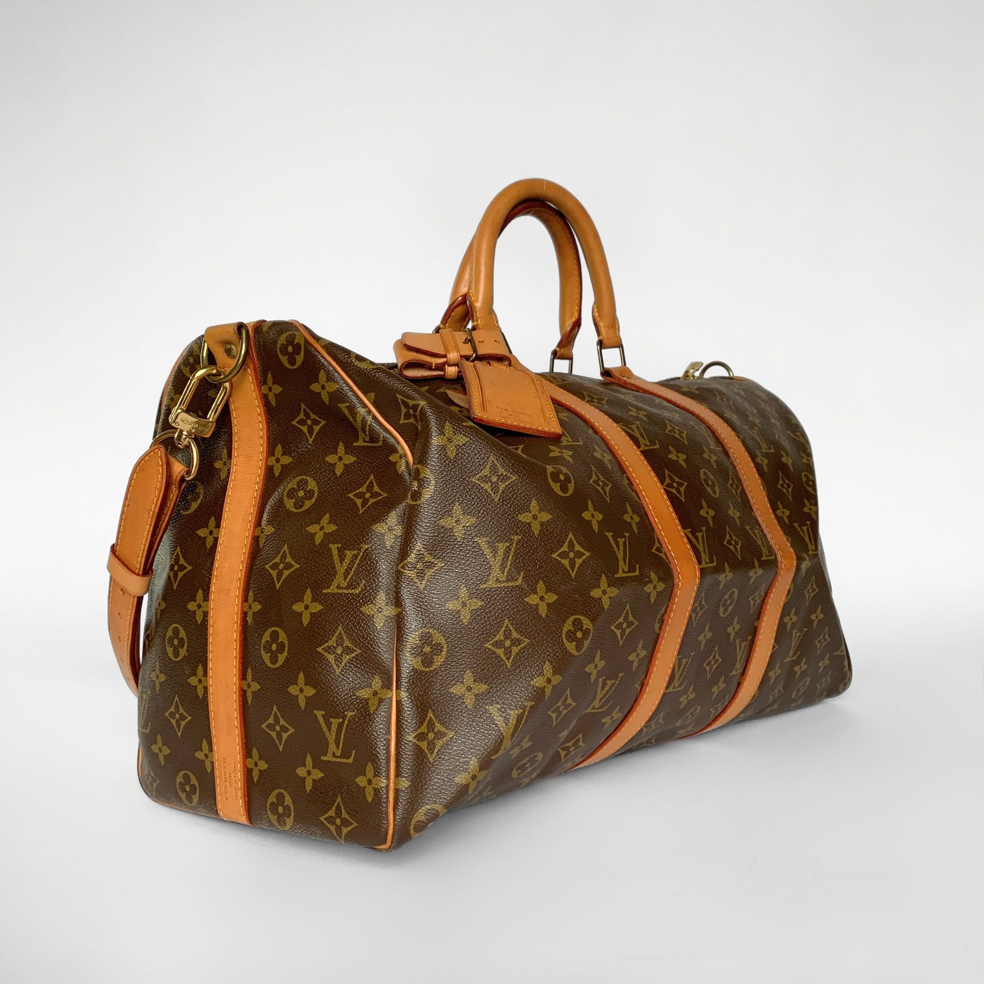 Louis Vuitton Louis Vuitton Keepall 50 Bandouli&egrave;re Monogram Canvas - Handbags - Etoile Luxury Vintage