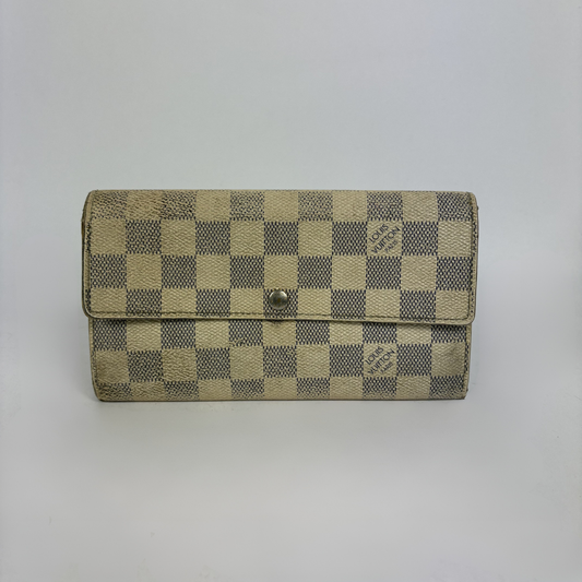 Louis Vuitton wallet on white background