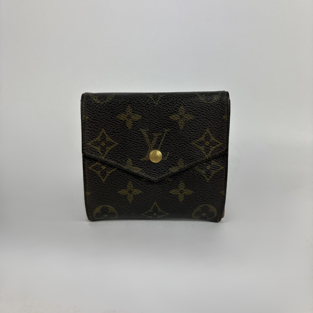 Louis Vuitton Druk Wallet on a white background