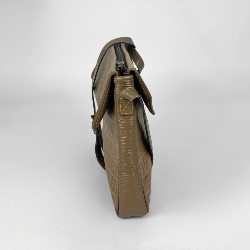 Brown leather bag on a white background