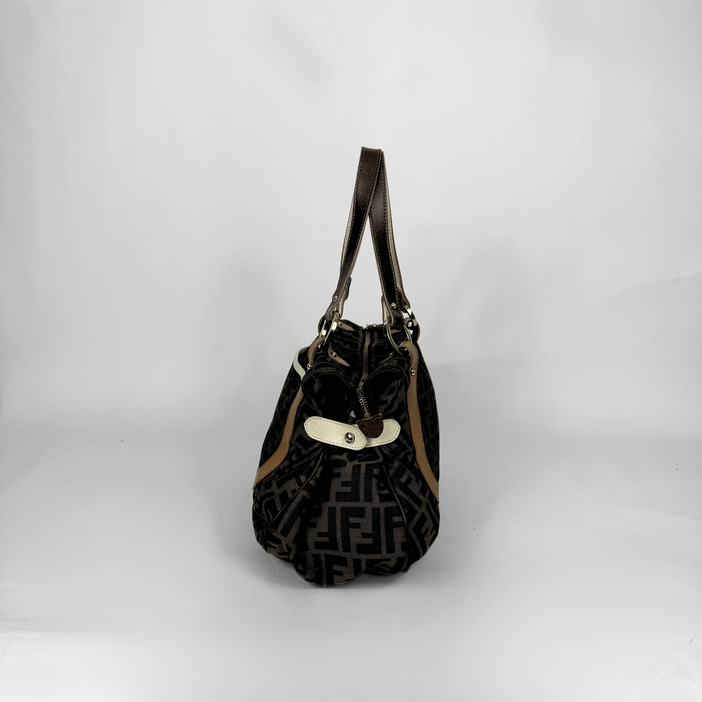 Fendi Zucca monogram canvas shoulder bag with letaher trim and a large white cicular FENDI charm.