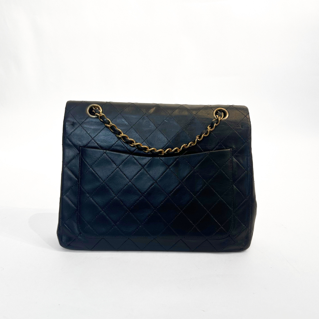 Chanel Classic Flap Bag Medium on a white background