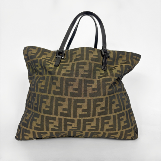 Fendi shopper bag in brown and black Zucca monogram canvas with black leather handles.