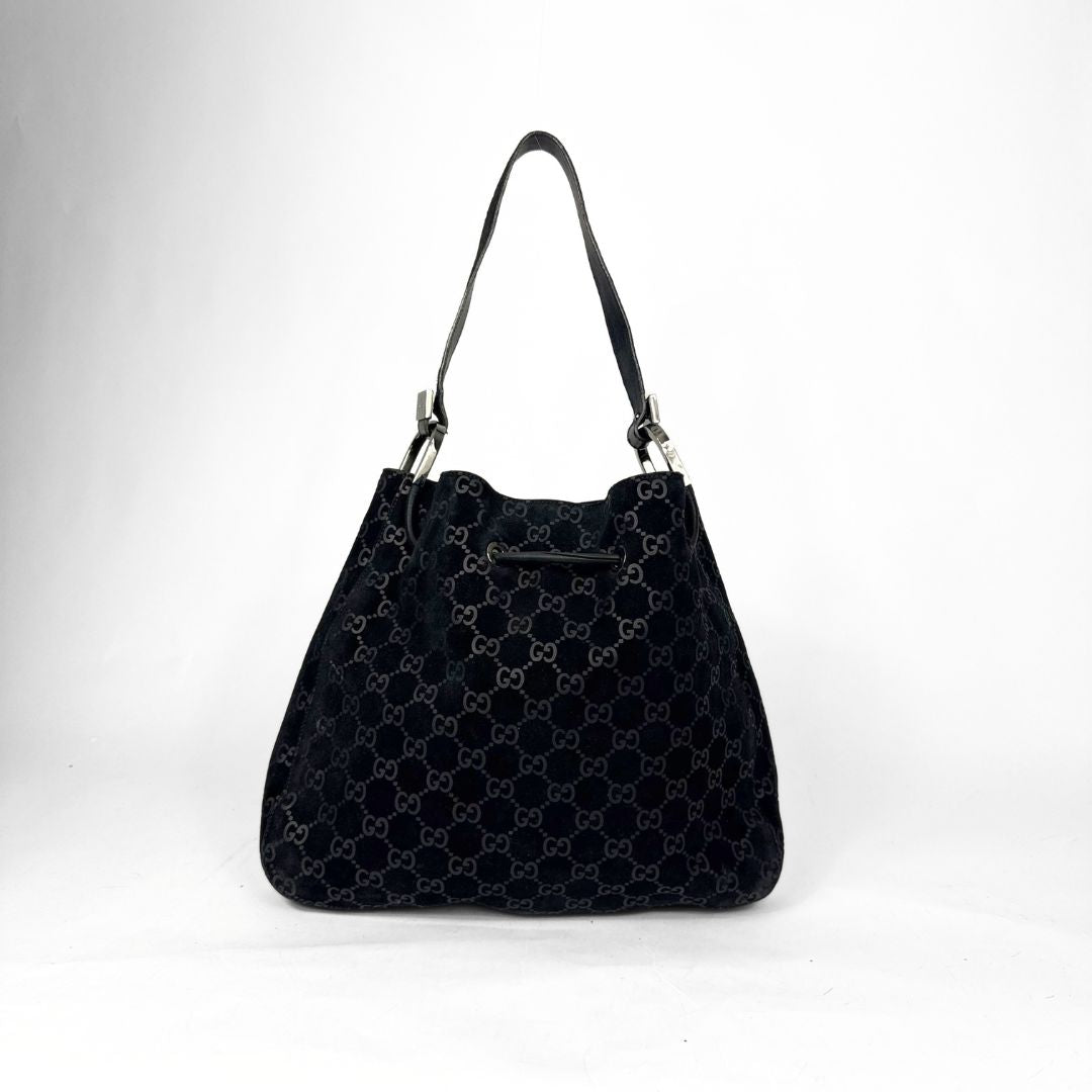 Borsa nera fantasia su sfondo bianco