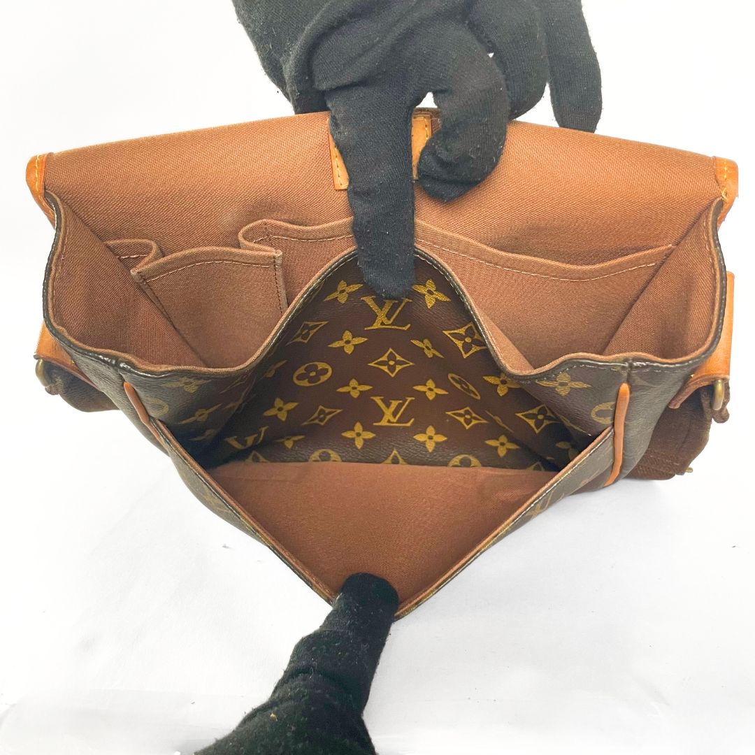 Louis Vuitton Bosphore Messenger in Monogram Canvas.