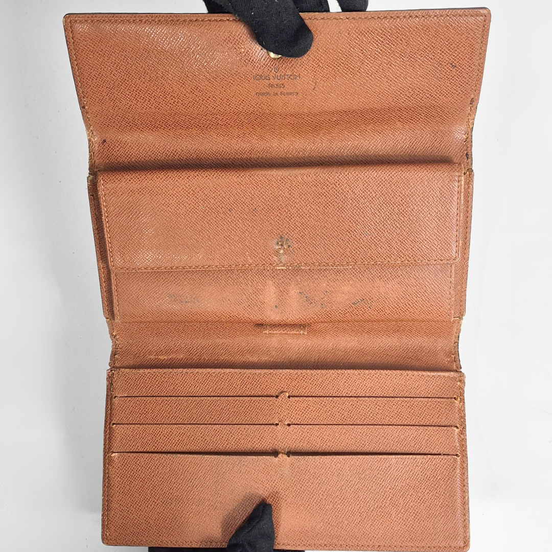 Inside of Louis Vuitton wallet with monogram