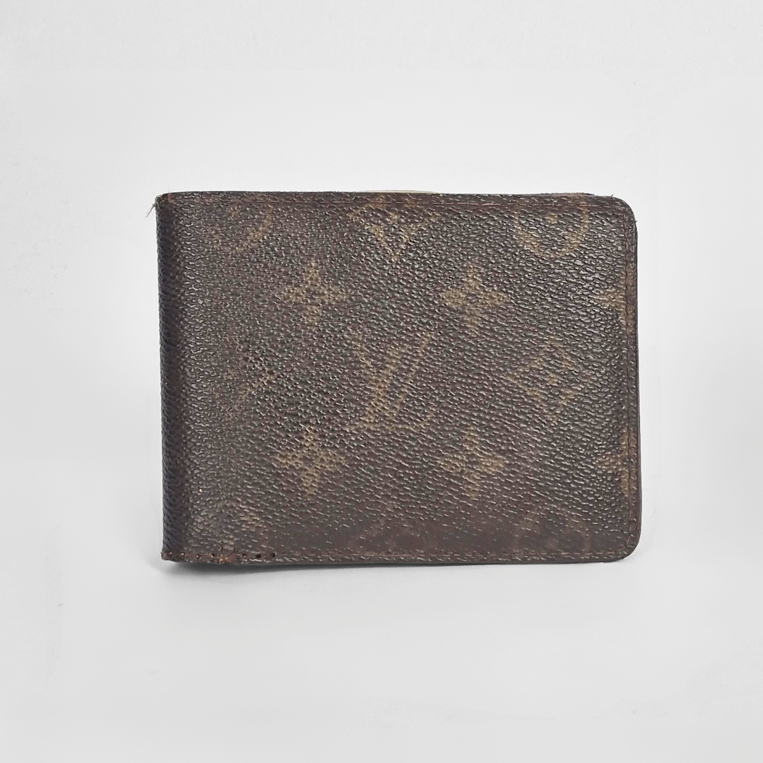 Brown leather wallet on a light gray background