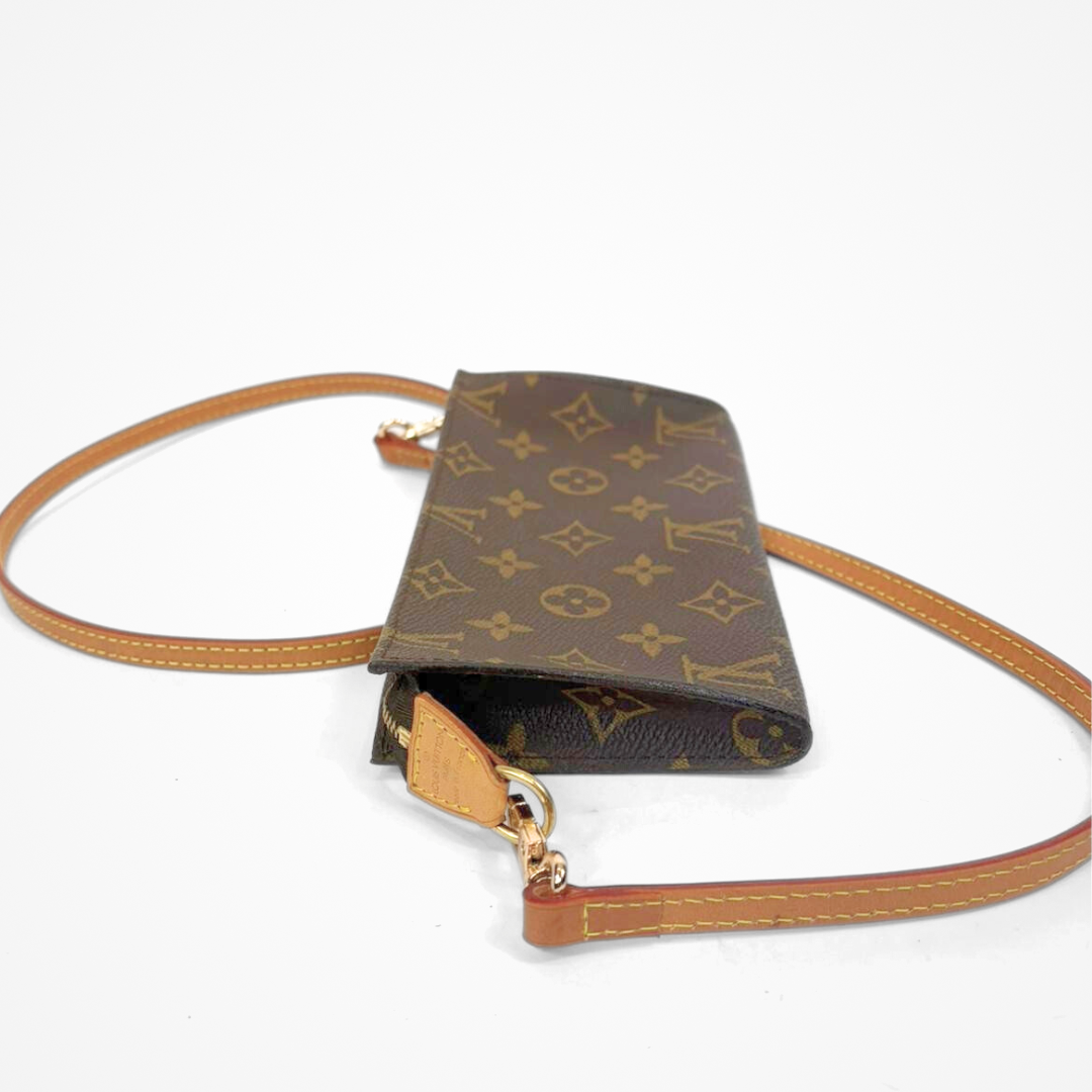 LV pouch with monogram pattern on a white background