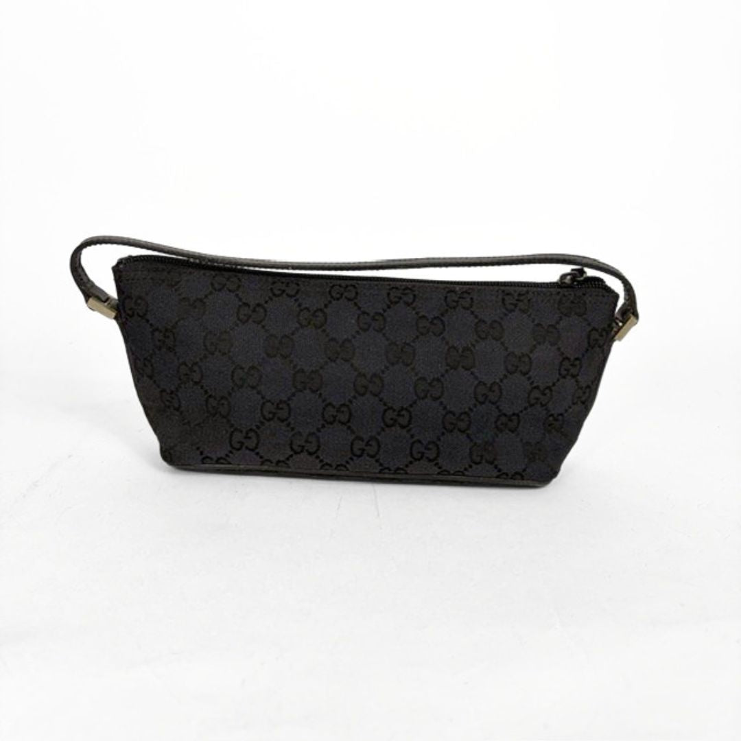 Black patterned handbag on a white background