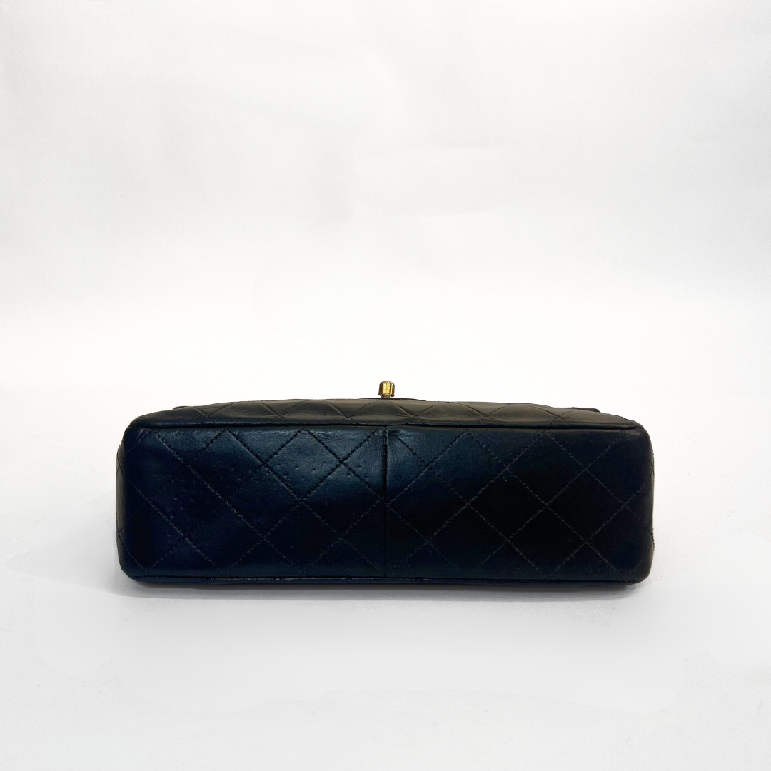 Chanel Classic Flap Bag Medium on a white background