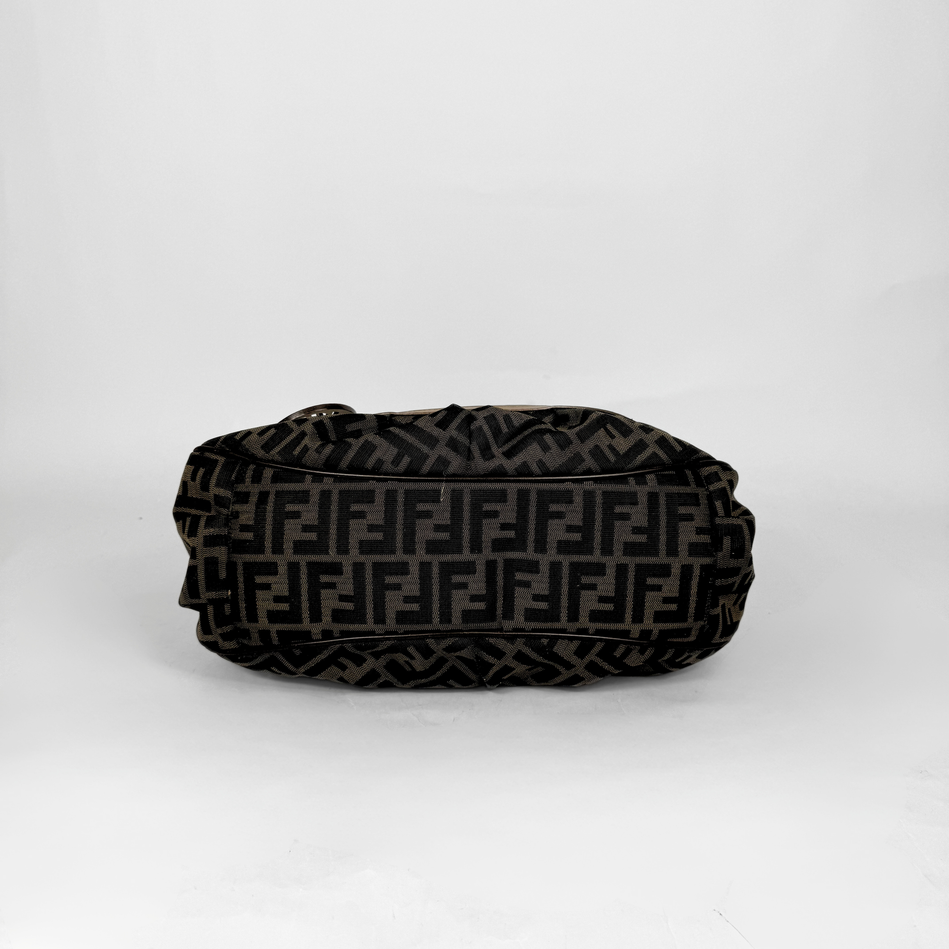 Fendi Zucca monogram canvas shoulder bag with letaher trim and a large white cicular FENDI charm.