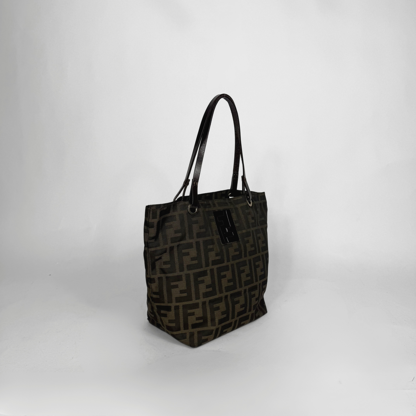 Black patterned tote bag on a white background