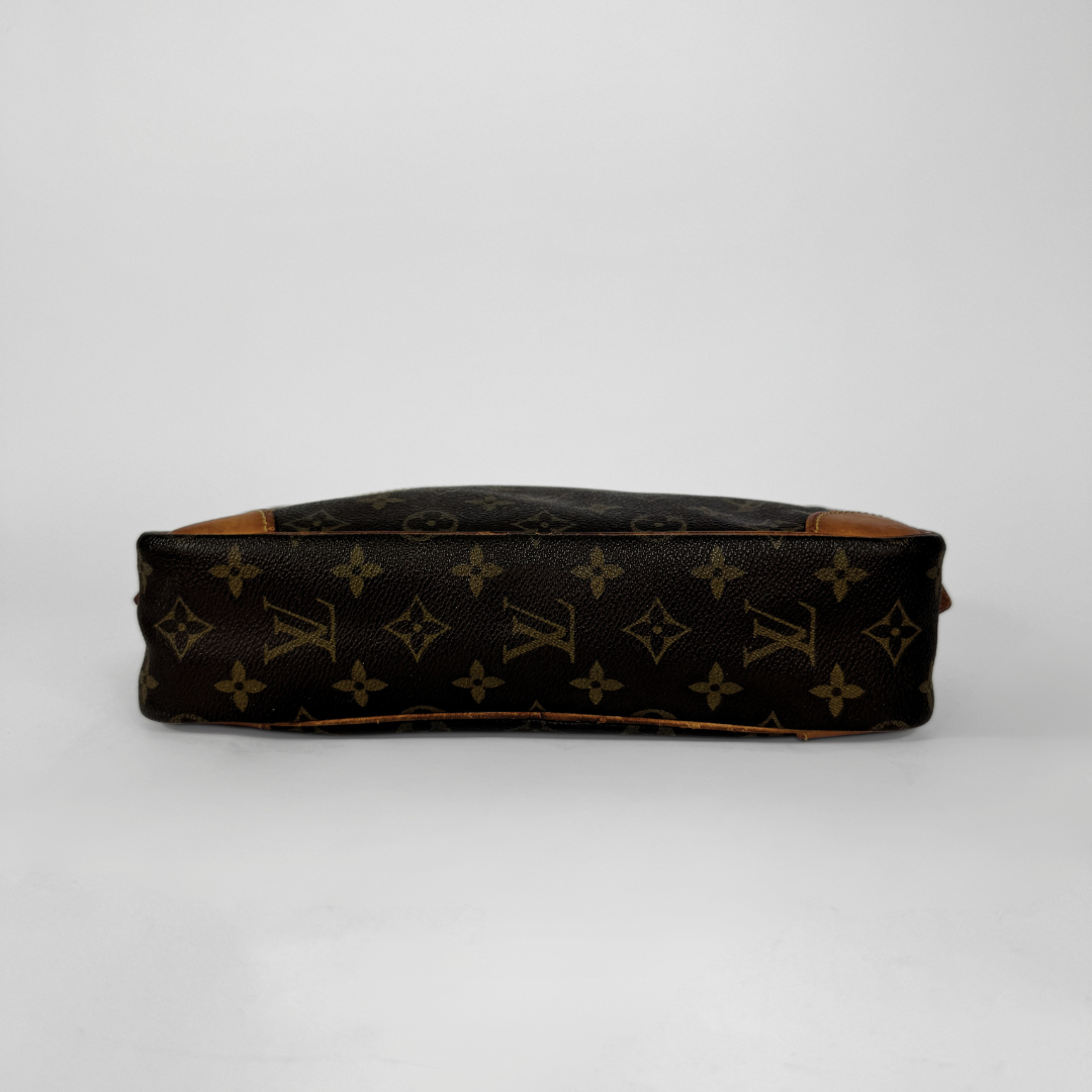 Louis Vuitton Compiegne Toiletry on a white 