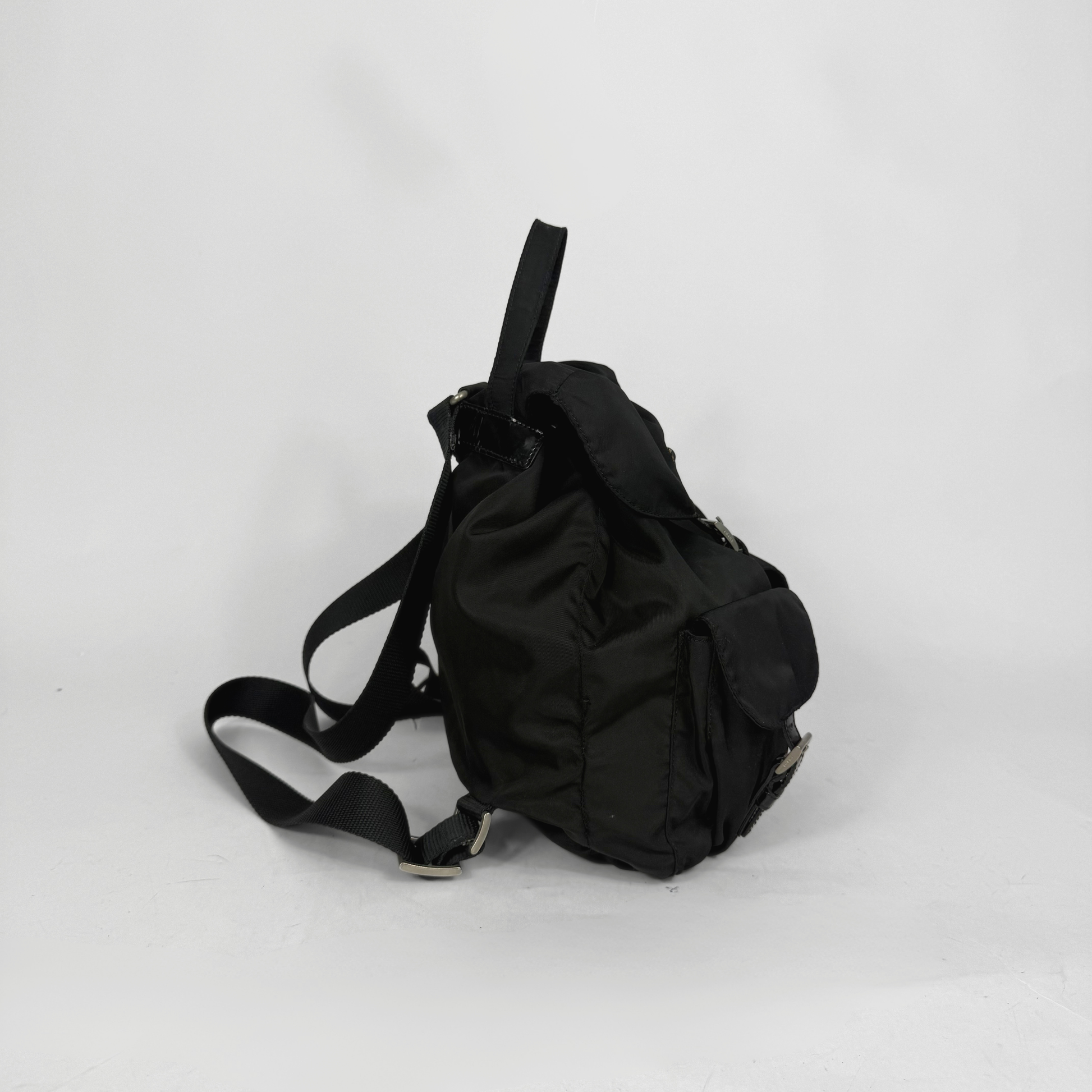 Black backpack on a white background